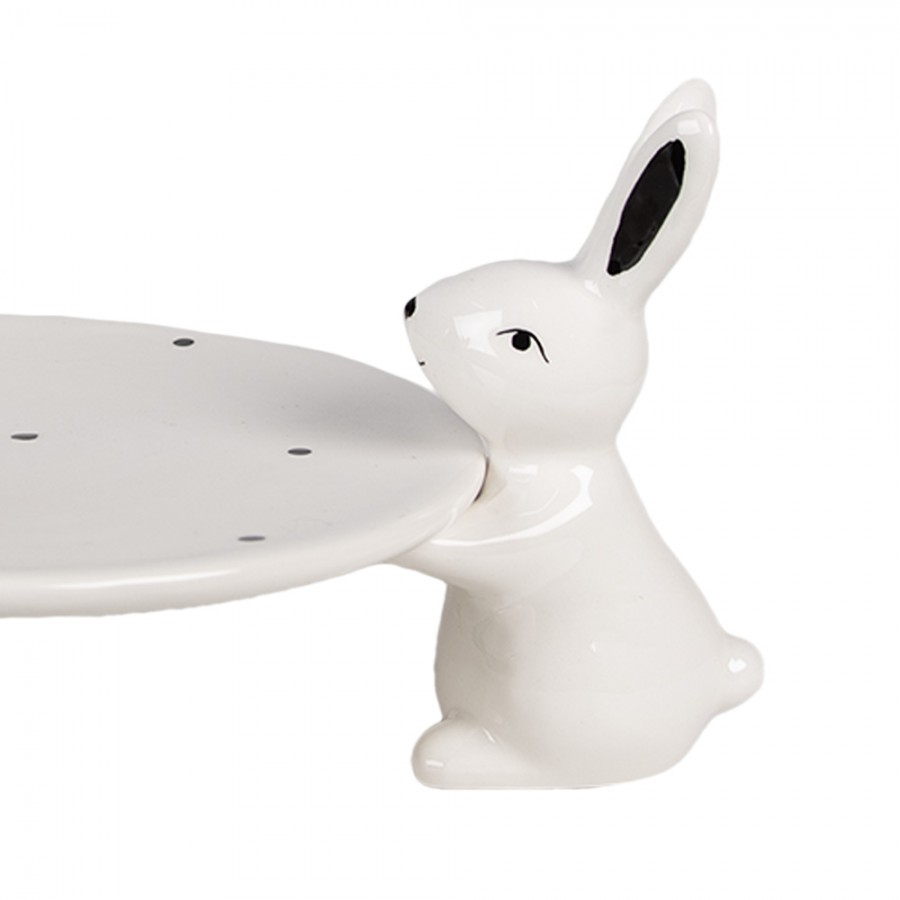 6ce1692-decorative-bowl-24x23x12-cm-white-black-ceramic-rabbits (1) 6ce1692 decorative bowl 24x23x12 cm white black ceramic rabbits 1 Прикрасьте свій великодній стіл чарівною тарілкою з кроликами! Ідеальна для святкових частувань та створення затишної атмосфери. <ul> <li>Кераміка преміум-класу: Надає вишуканості та довговічності, тішитиме вас роками.</li> <li>Розміри 12 x 24 x 24 см: Оптимальний розмір для подачі закусок чи десертів, не займає багато місця.</li> <li>Білий та чорний кольори: Легко поєднується з будь-яким сервіруванням столу, додаючи елегантності.</li> <li>Великодній дизайн: Створює святковий настрій та підкреслює особливість події.</li> </ul>