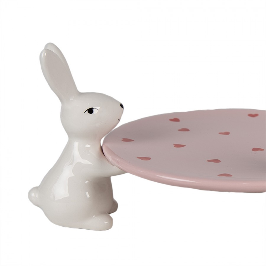 6ce1693-decorative-bowl-24x23x12-cm-pink-white-ceramic-rabbits (1) 6ce1693 decorative bowl 24x23x12 cm pink white ceramic rabbits 1 Святкова тарілка з кроликами – додайте весняного настрою вашому столу! Ідеальна для великодніх частувань та створення затишної атмосфери. <ul> <li>Кераміка: Міцна та елегантна, прослужить довгі роки.</li> <li>Білий та рожевий колір: Підкреслить ніжність та вишуканість сервірування.</li> <li>Розміри 12 x 24 x 24 см: Оптимальний розмір для подачі десертів чи закусок.</li> <li>Вага 0.5 кг: Легка та зручна у використанні.</li> </ul>