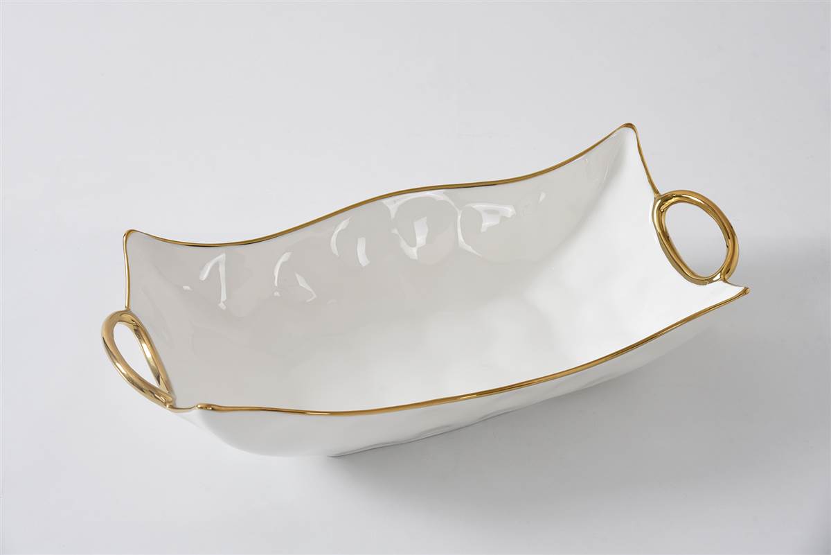 CER1786WG cer1786wg <p data-start="282" data-end="481"><strong>Глибоке сервірувальне блюдо Rectangular Centerpiece</strong> створене для ефектної подачі основних страв і гарнірів. Біла порцеляна у поєднанні з витонченими золотими ручками надає сервіруванню особливої елегантності, а містка форма робить блюдо ідеальним як для святкового столу, так і для щоденного використання.</p>